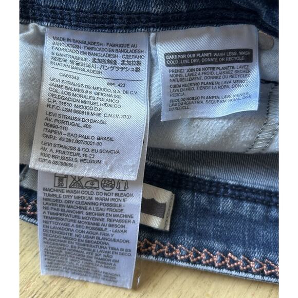 Y2K Levis Woman's Shorts Size 4 Med Wash Mid Rise Stretch Moms Thrashed Distress - Picture 8 of 8